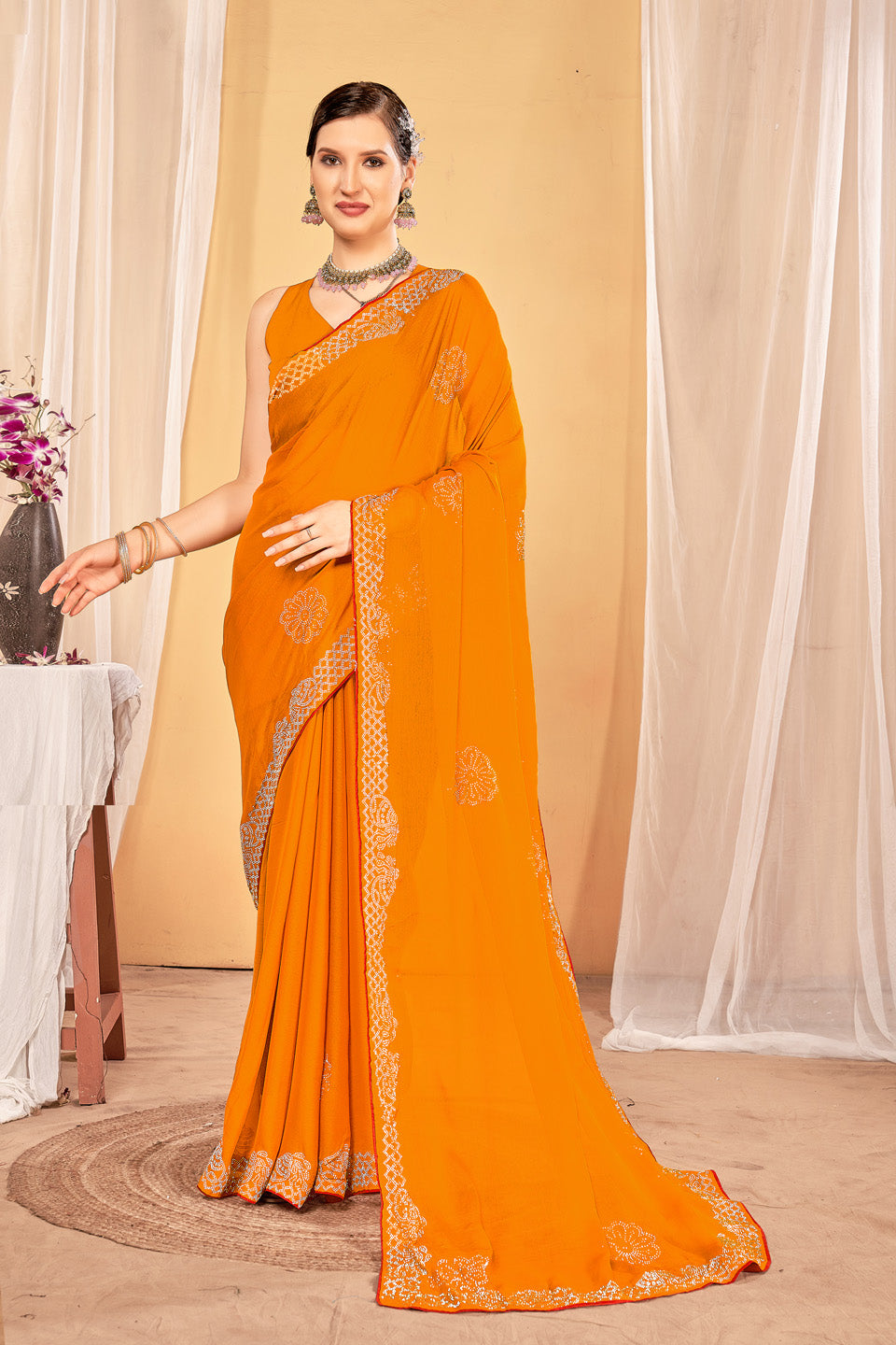 Zamuna Women Orange Georgette Solid Diamond Saree – Radiant Elegance in Vibrant Orange