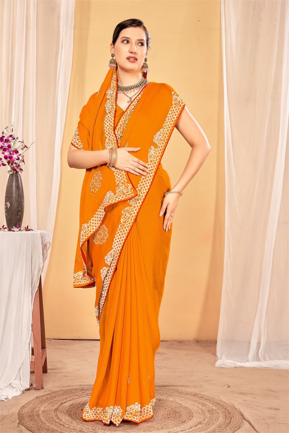 Zamuna Women Orange Georgette Solid Diamond Saree – Radiant Elegance in Vibrant Orange
