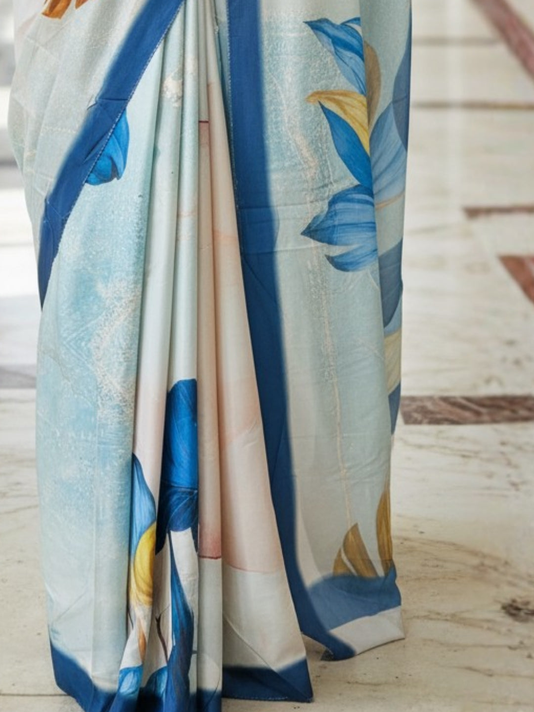 Zamuna Women White, Blue & Golden Satin Crepe Floral Digital Print Saree – The Essence of Royal Elegance